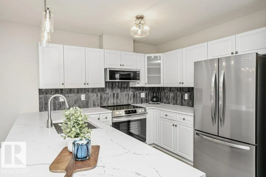 #202 278 SUDER GREENS DR NW