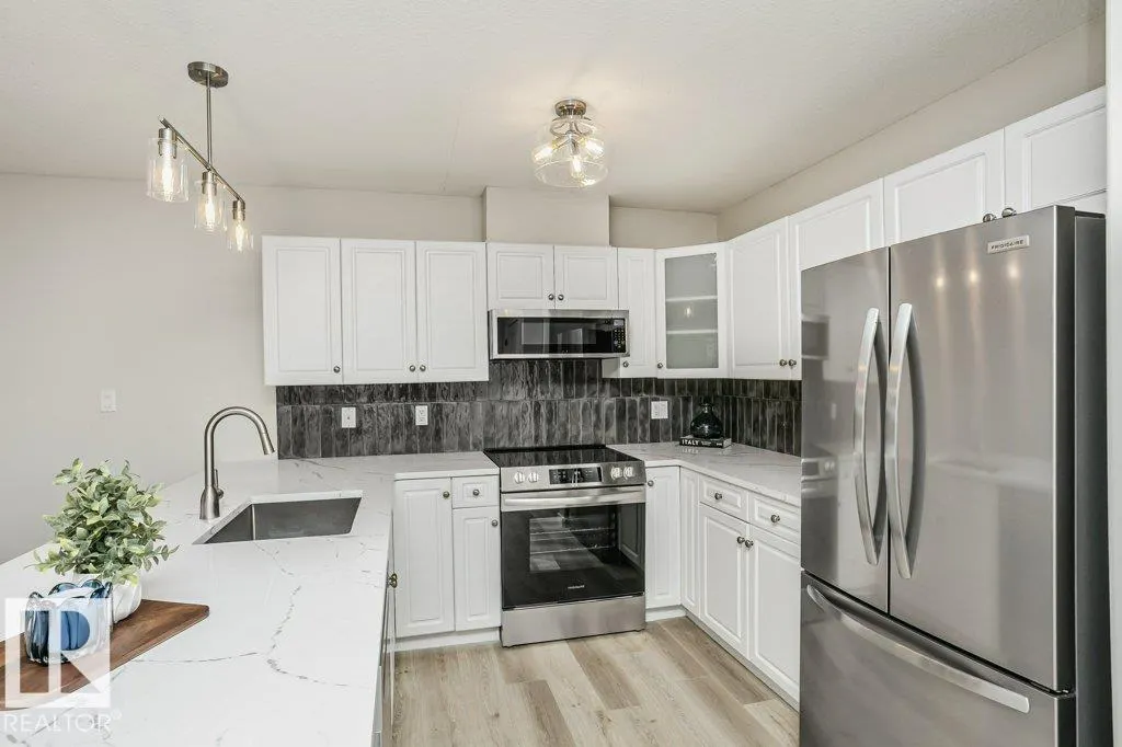 #202 278 SUDER GREENS DR NW