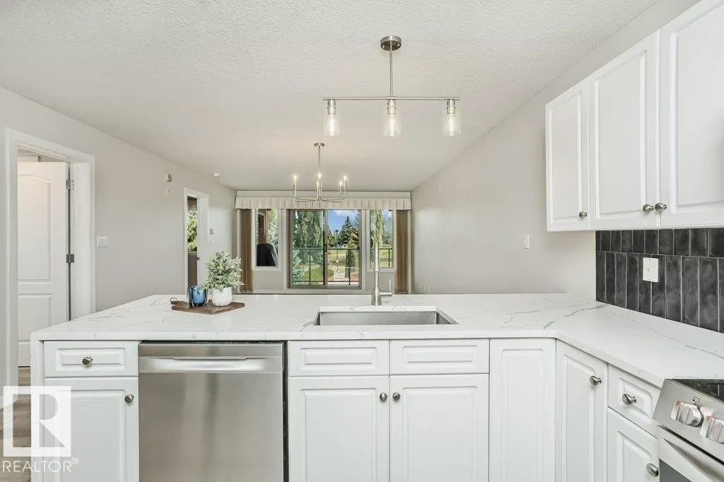 #202 278 SUDER GREENS DR NW