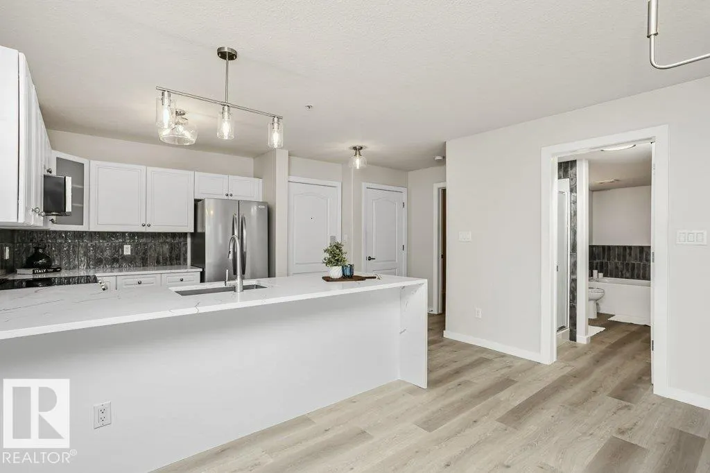 #202 278 SUDER GREENS DR NW