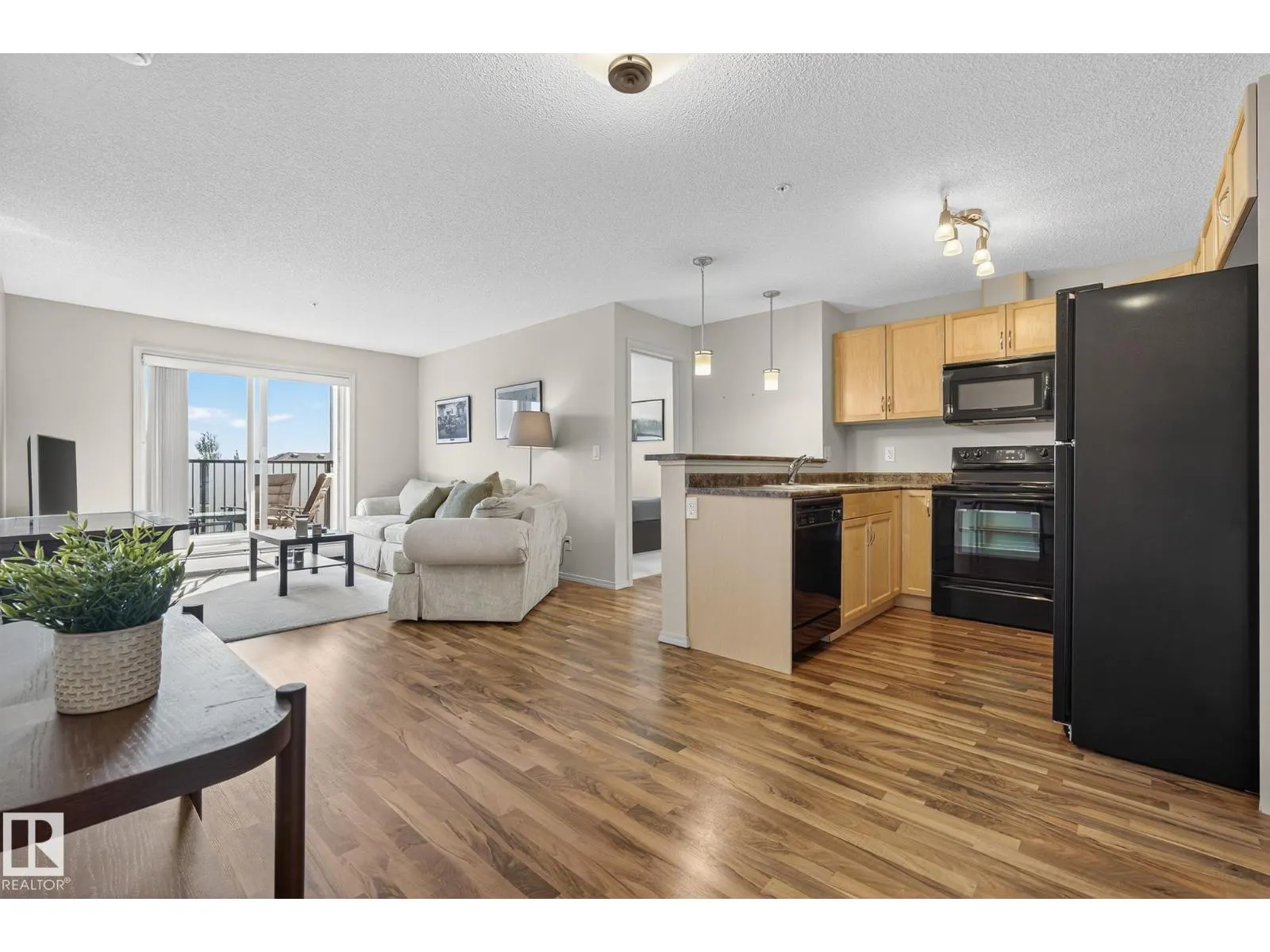 #310 6070 SCHONSEE WY NW