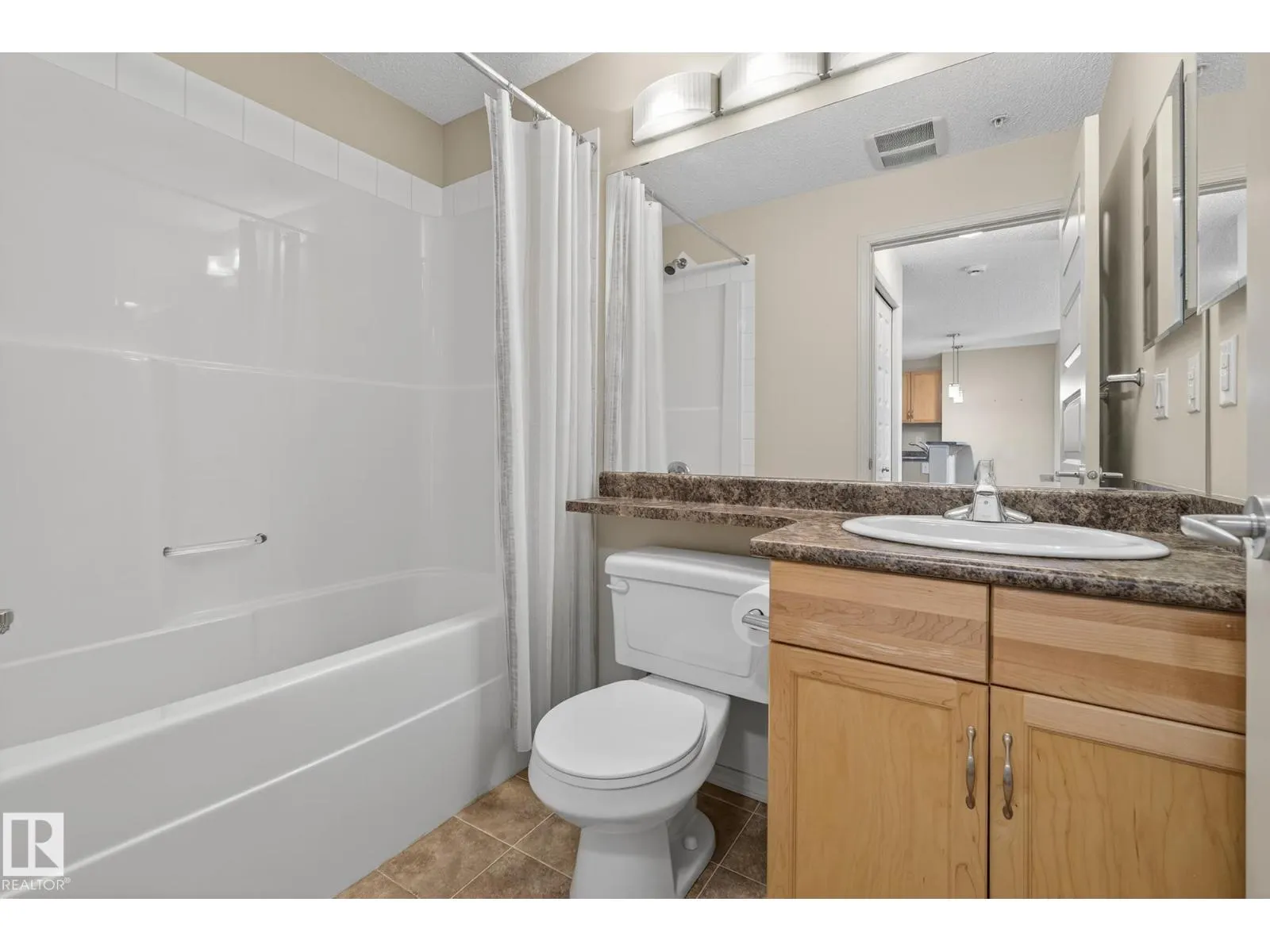 #310 6070 SCHONSEE WY NW