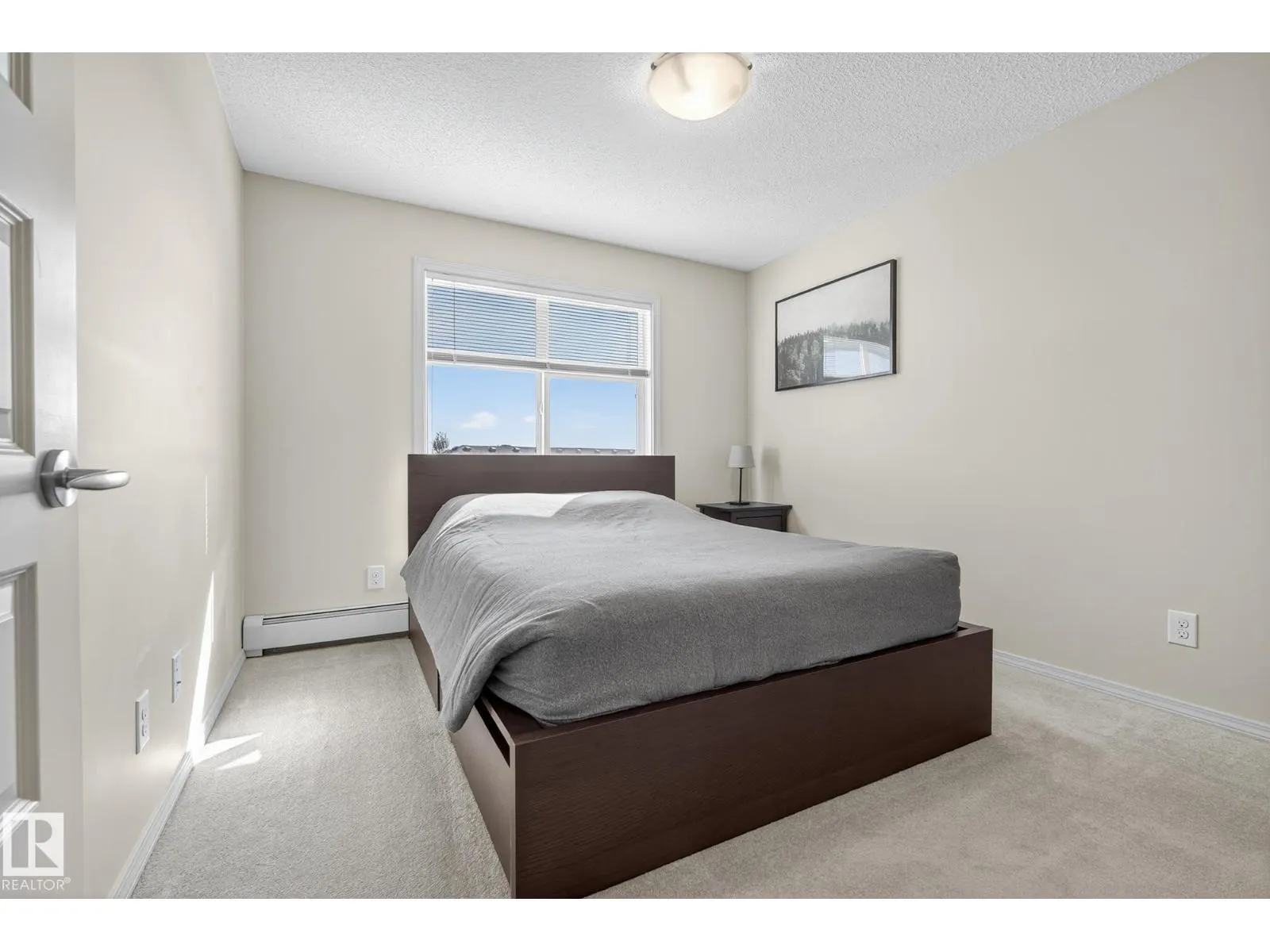 #310 6070 SCHONSEE WY NW