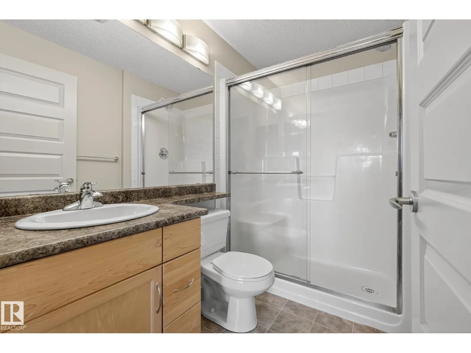 #310 6070 SCHONSEE WY NW