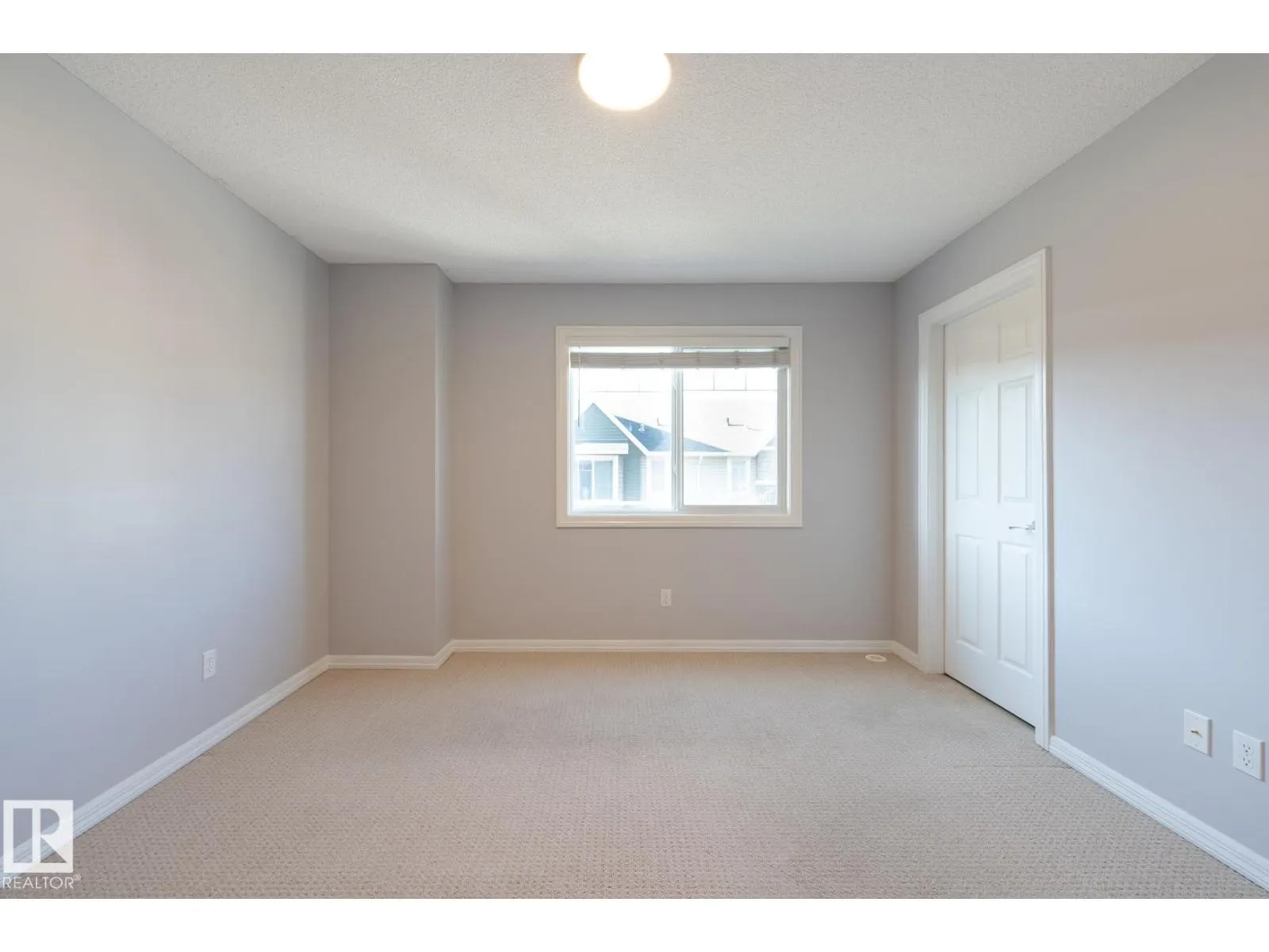 #103 655 TAMARACK RD NW