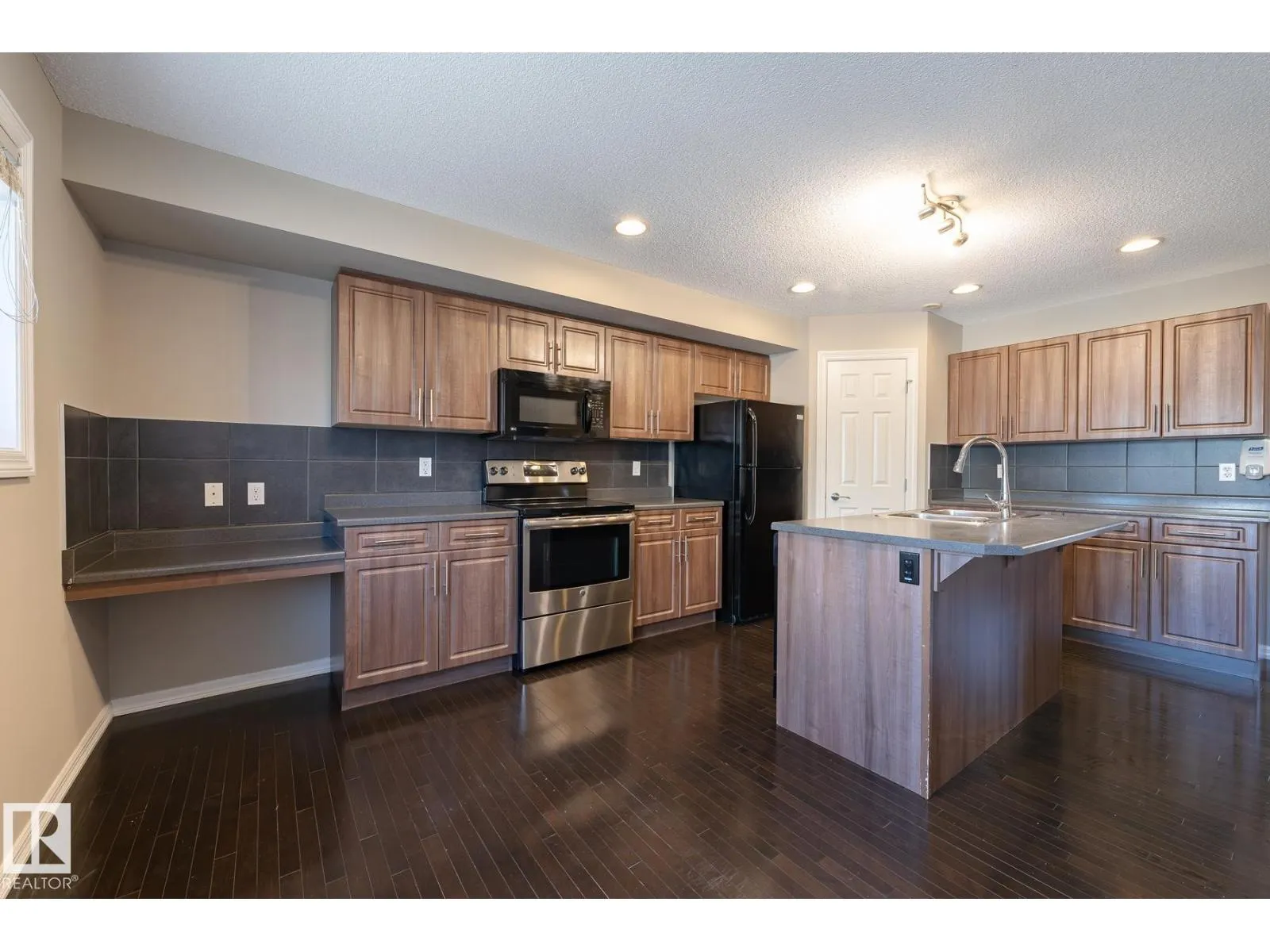 #103 655 TAMARACK RD NW