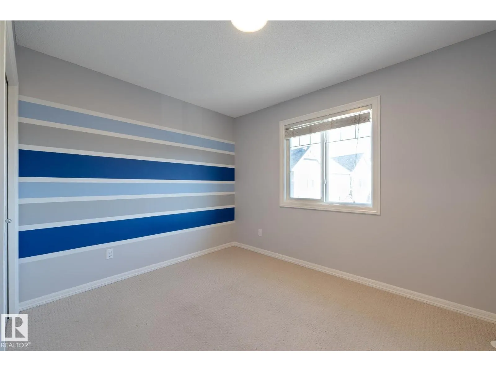 #103 655 TAMARACK RD NW