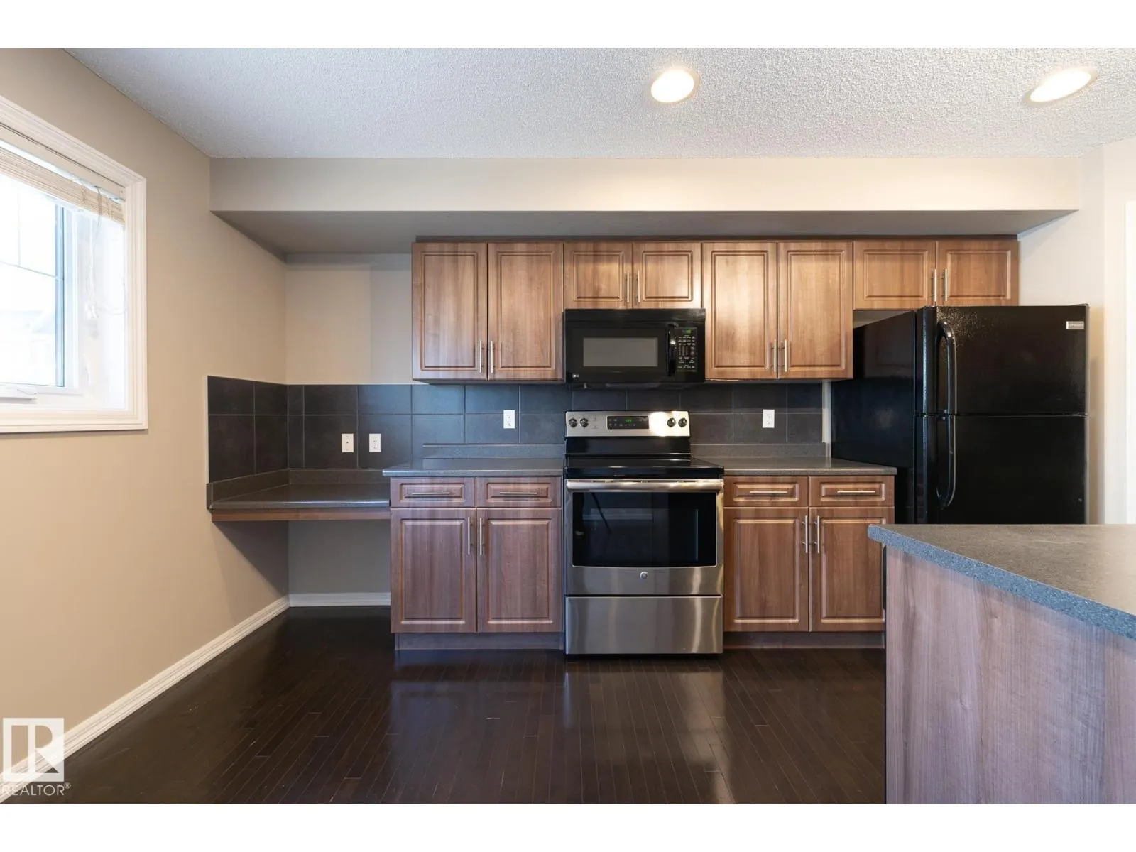 #103 655 TAMARACK RD NW