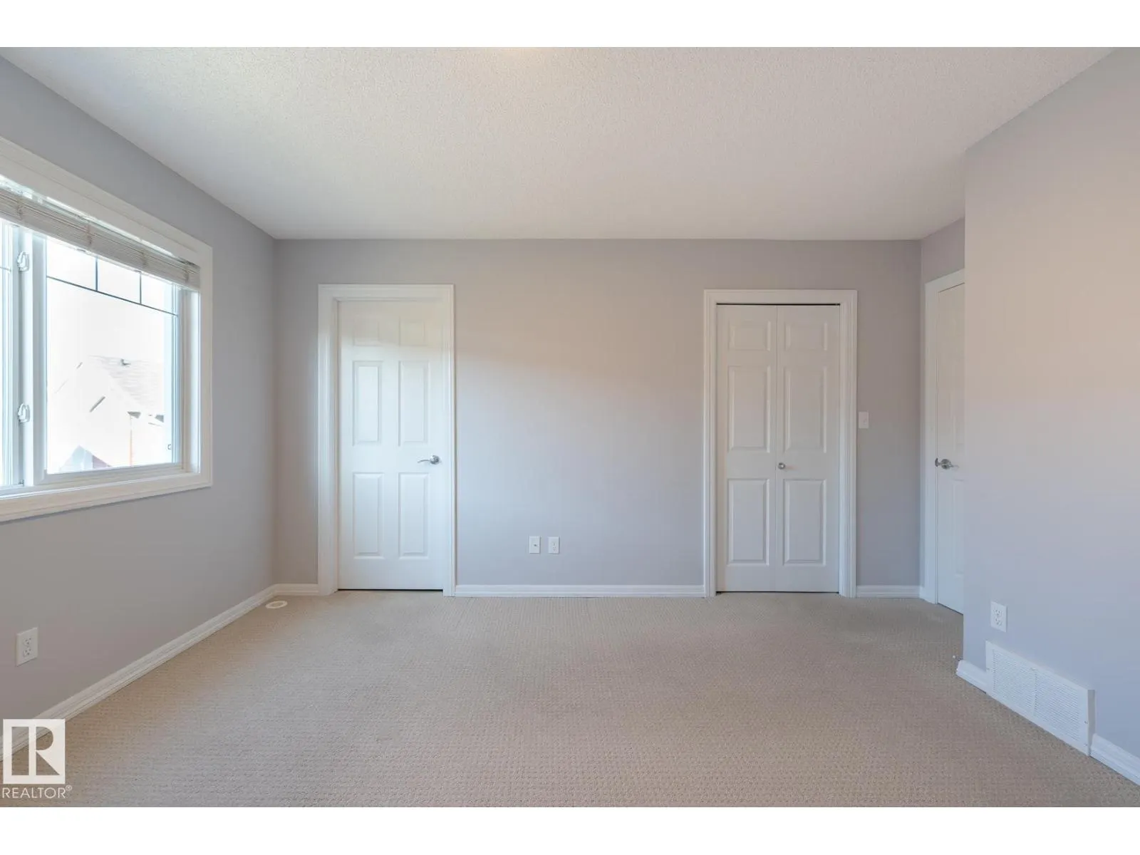 #103 655 TAMARACK RD NW