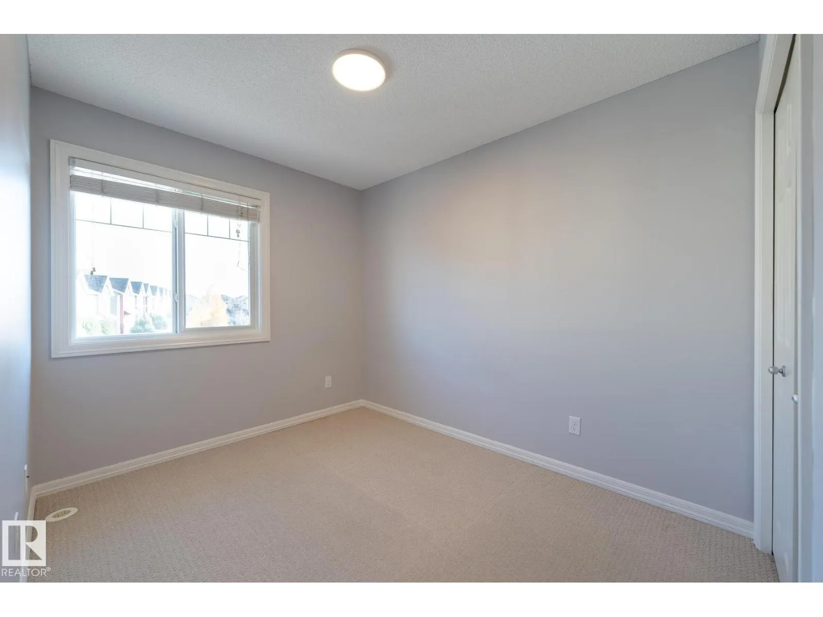 #103 655 TAMARACK RD NW