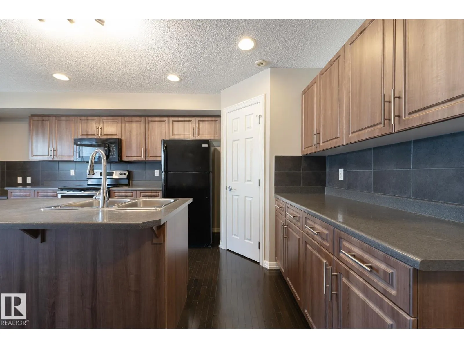 #103 655 TAMARACK RD NW