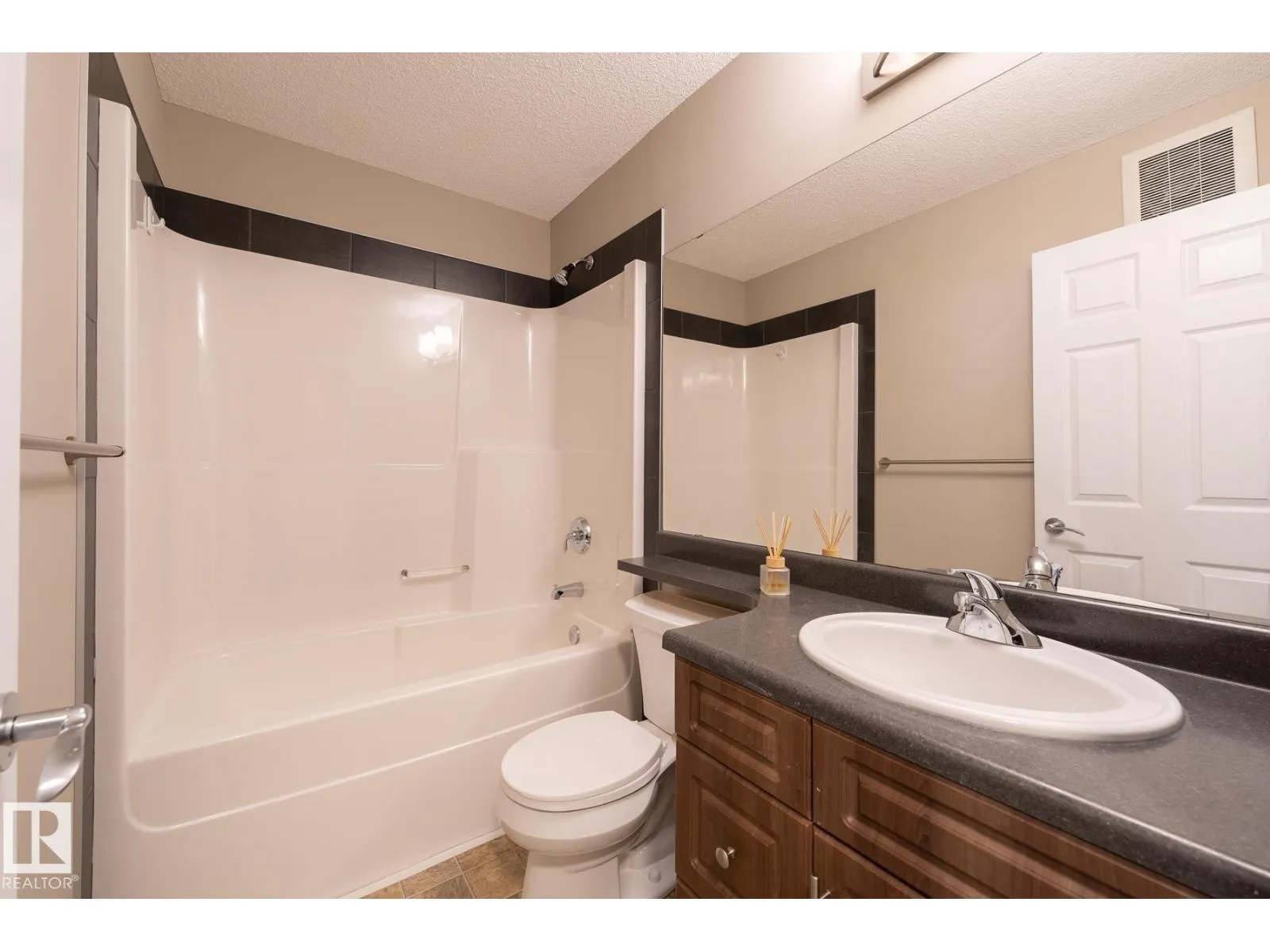 #103 655 TAMARACK RD NW