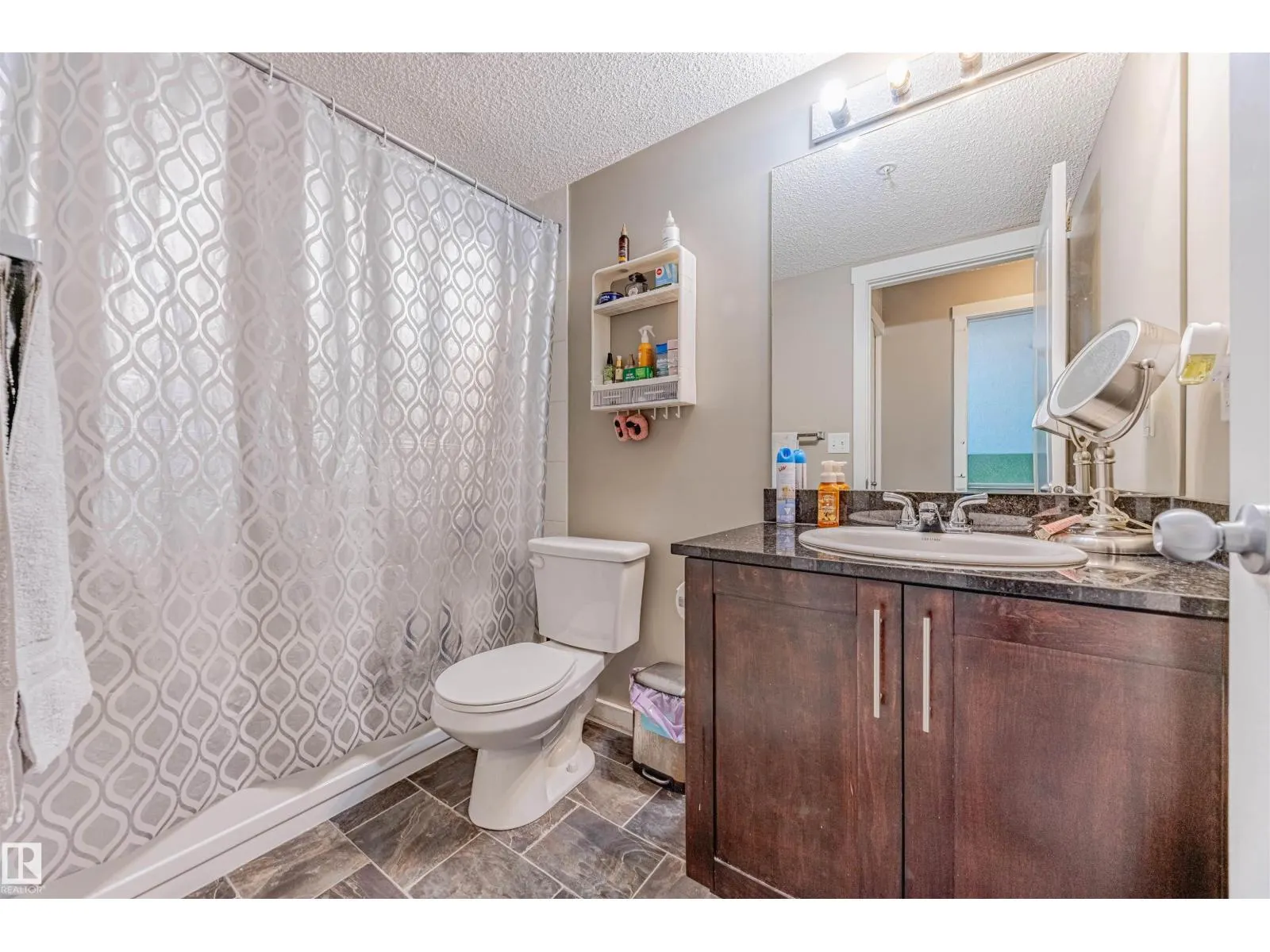 #202 5816 MULLEN PL NW