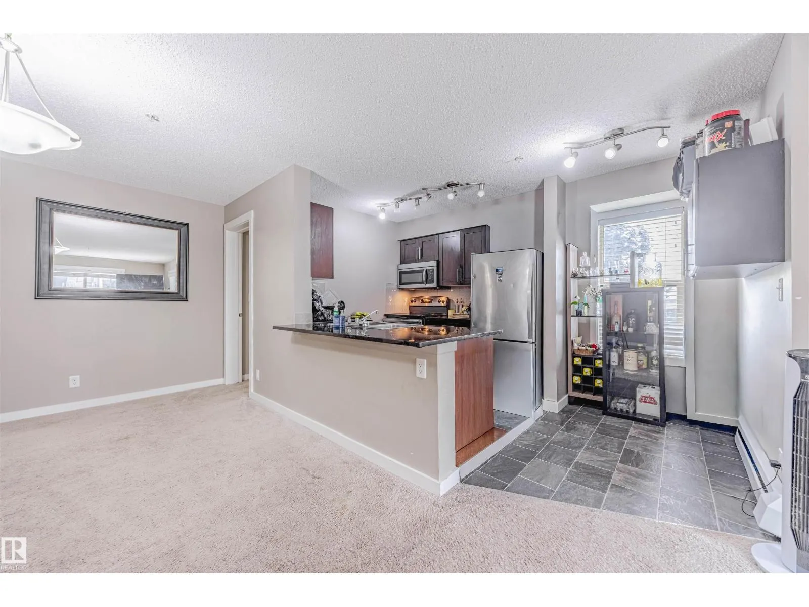 #202 5816 MULLEN PL NW