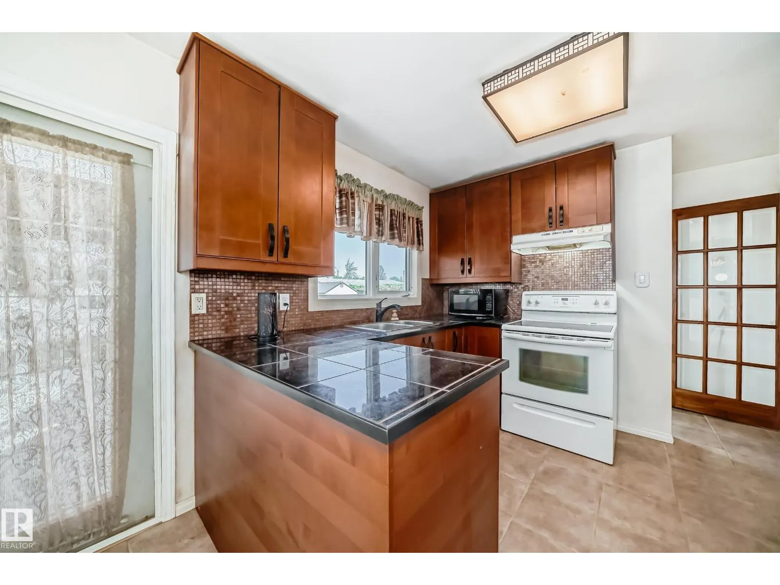 6308 144A AV NW