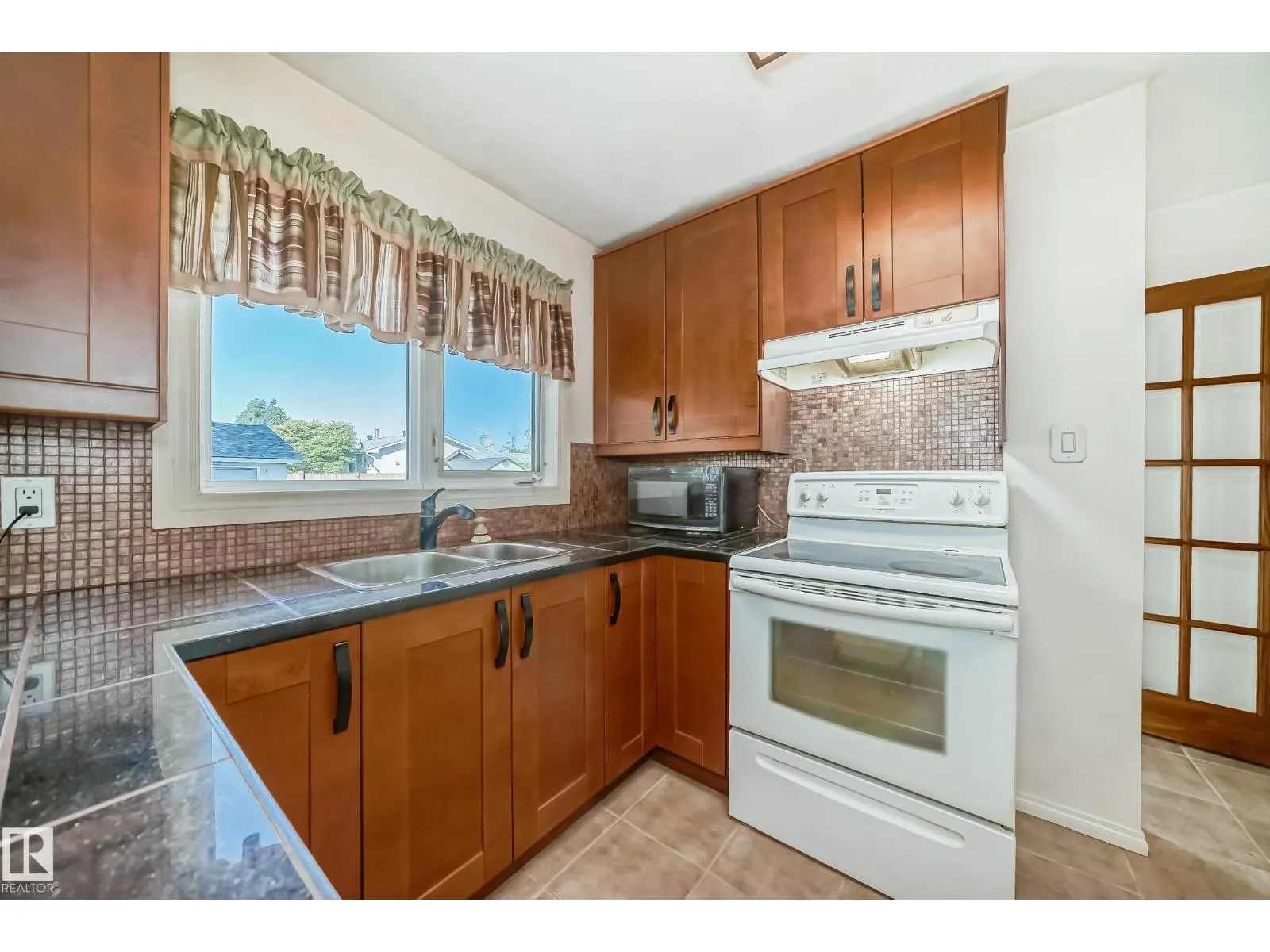 6308 144A AV NW