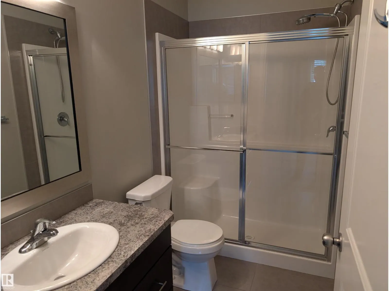 #59 18230 104A ST NW