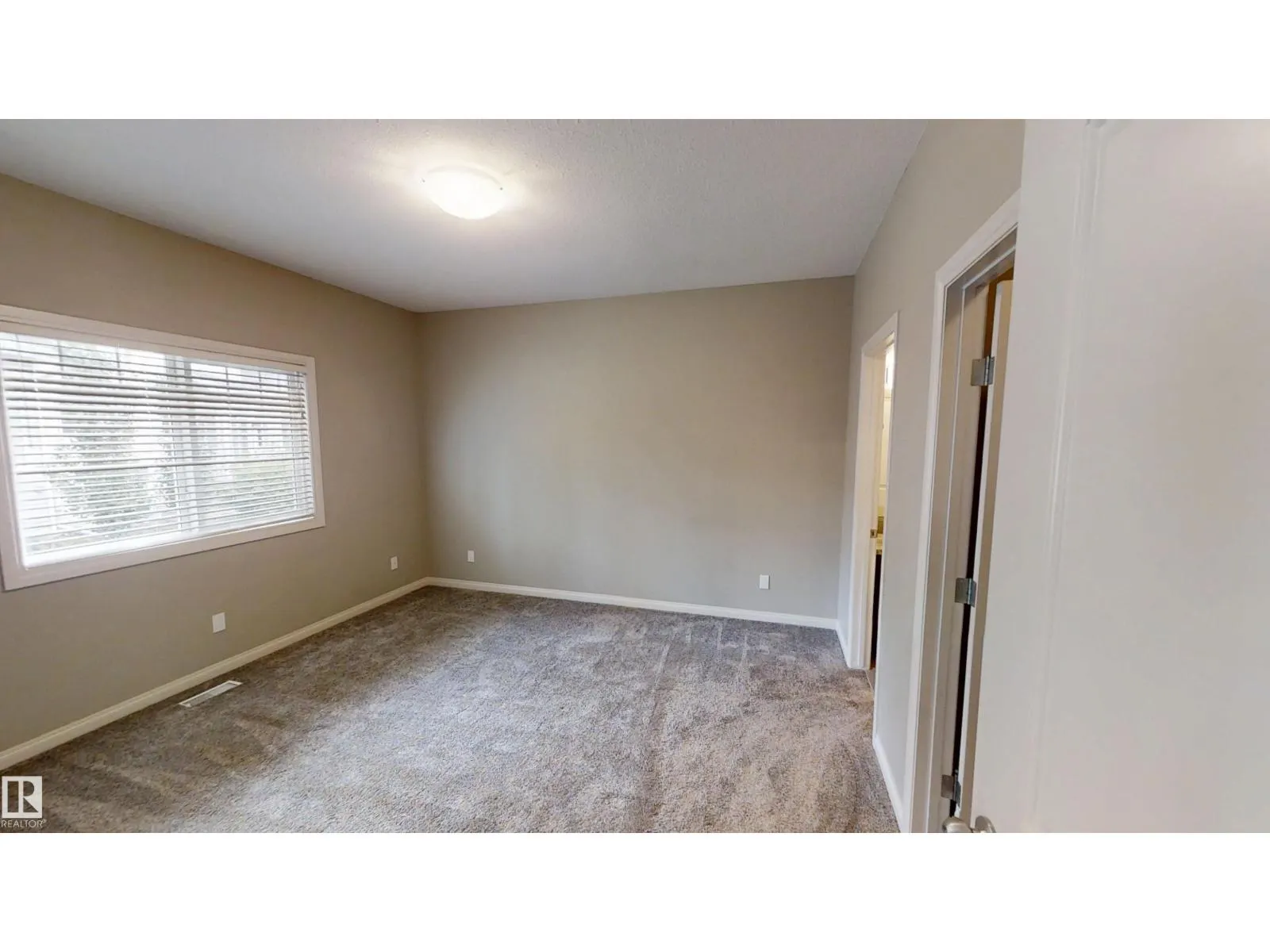 #59 18230 104A ST NW
