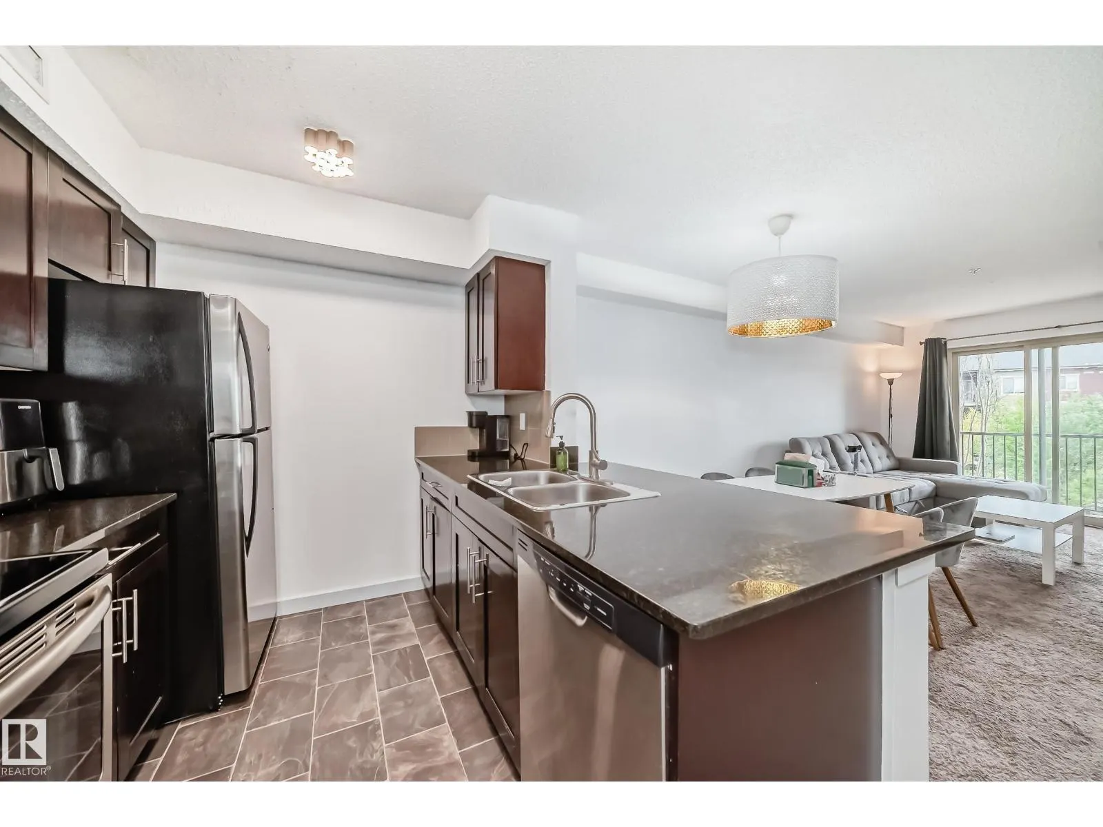 #303 1070 McConachie Blvd NW