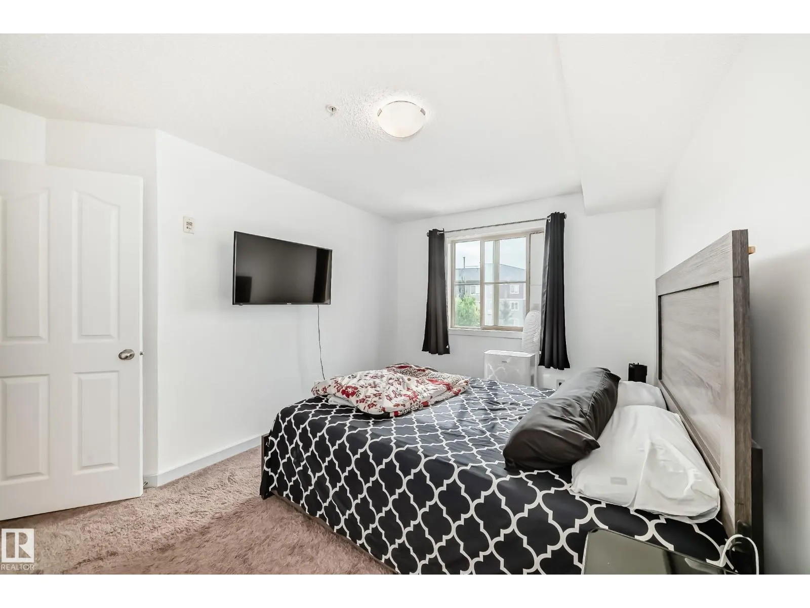 #303 1070 McConachie Blvd NW
