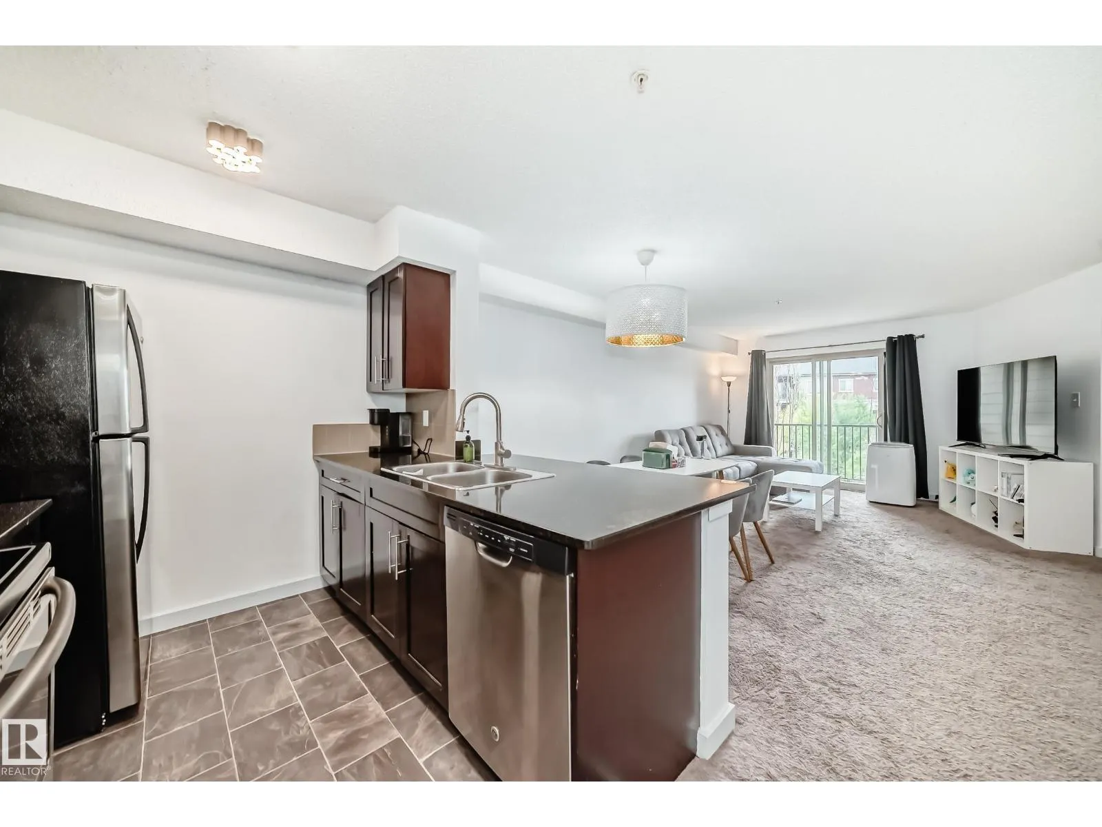 #303 1070 McConachie Blvd NW