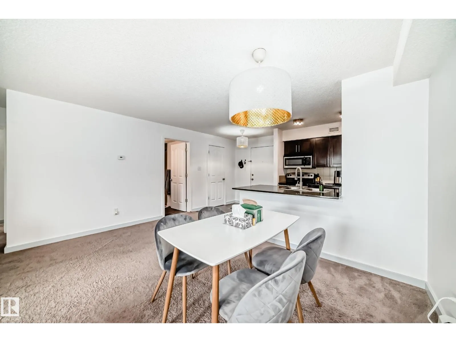 #303 1070 McConachie Blvd NW