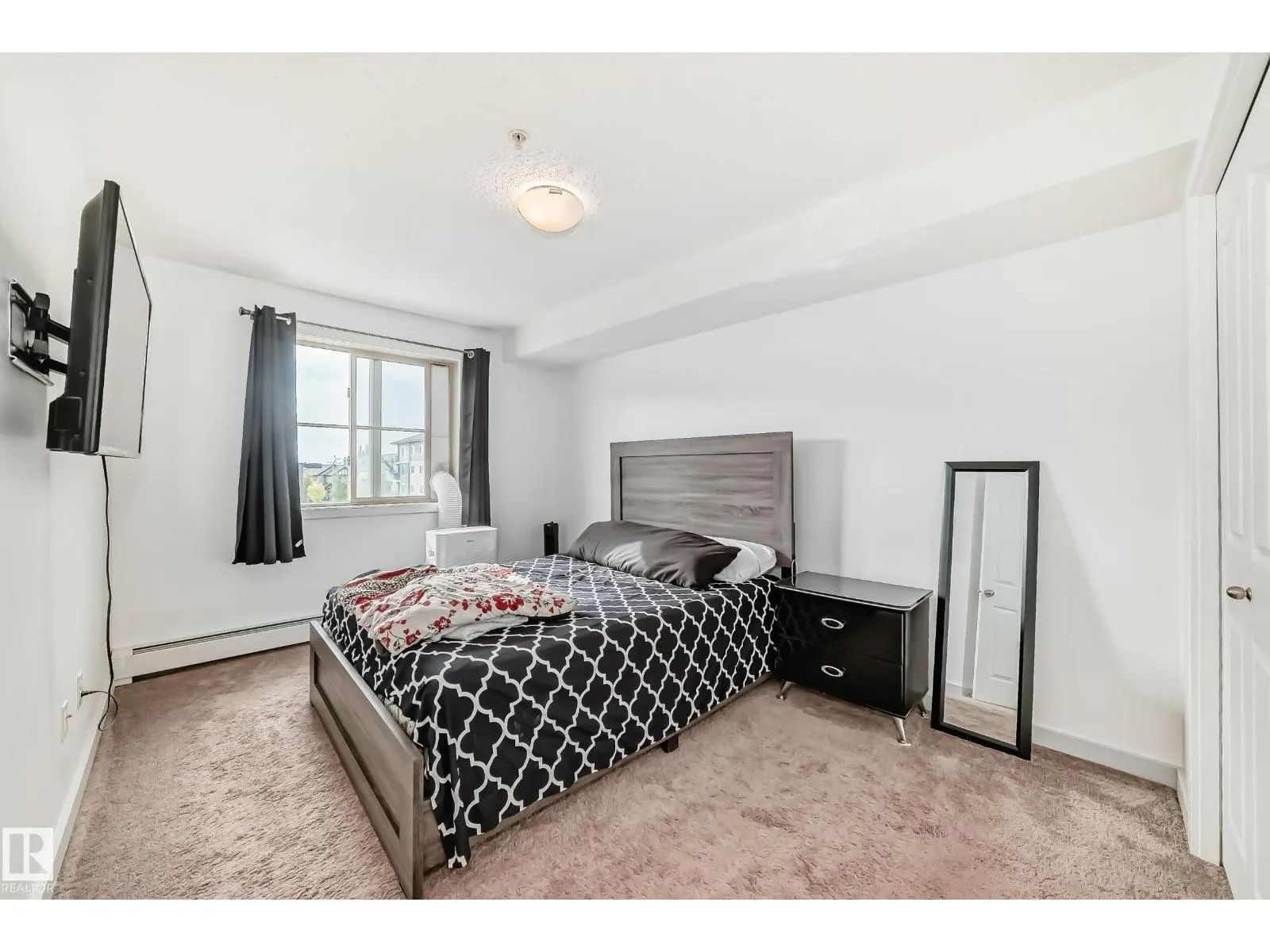 #303 1070 McConachie Blvd NW