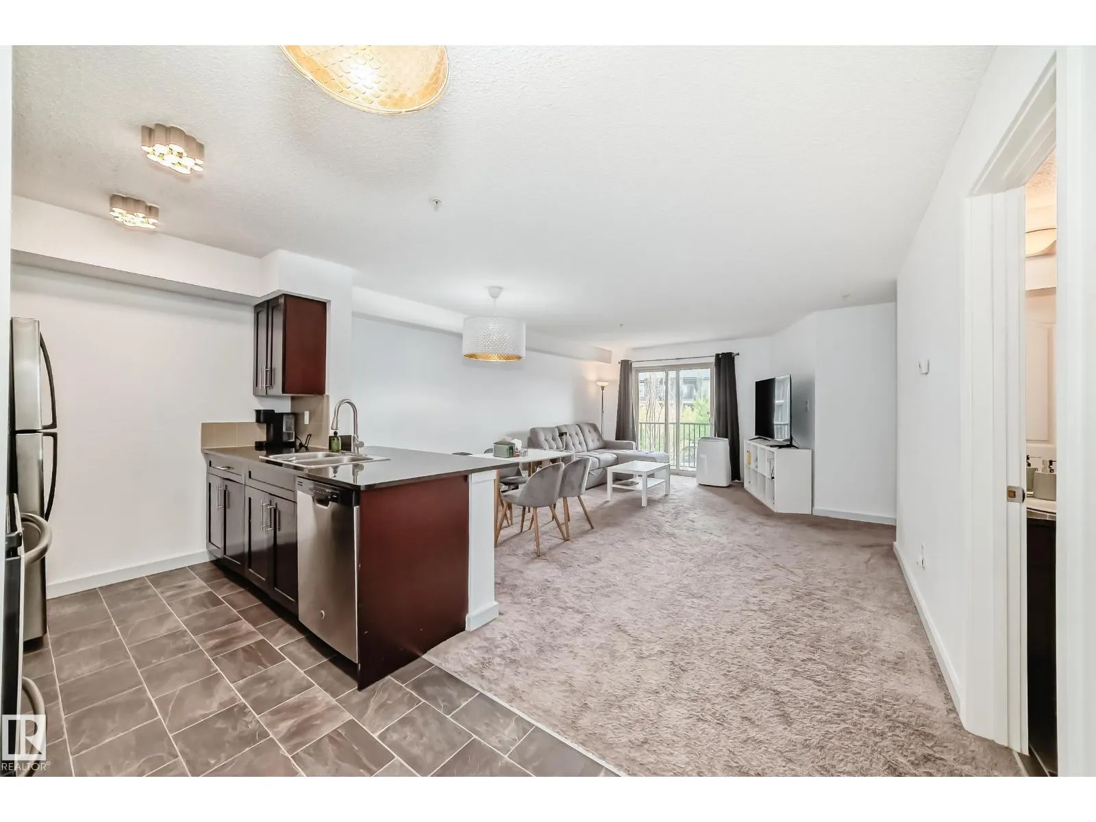 #303 1070 McConachie Blvd NW