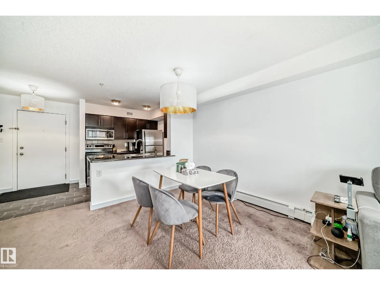 #303 1070 McConachie Blvd NW
