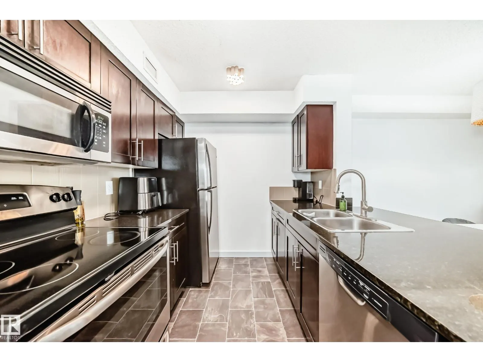 #303 1070 McConachie Blvd NW