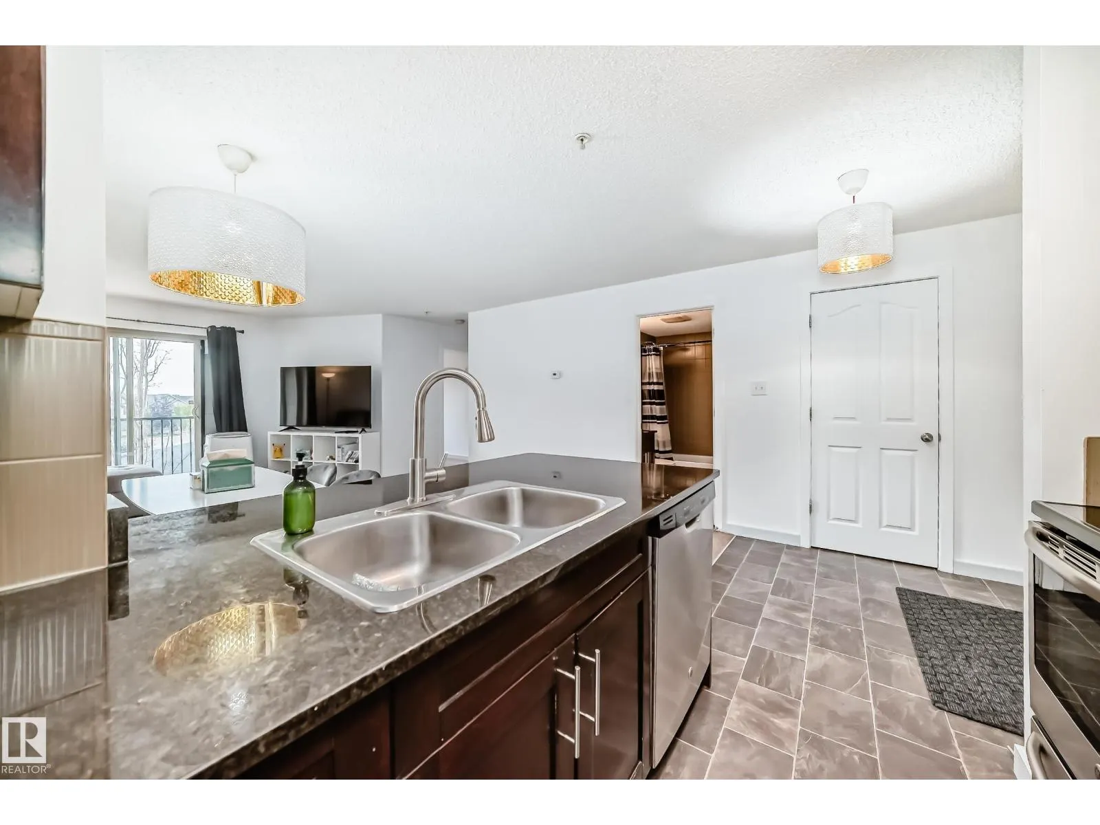 #303 1070 McConachie Blvd NW