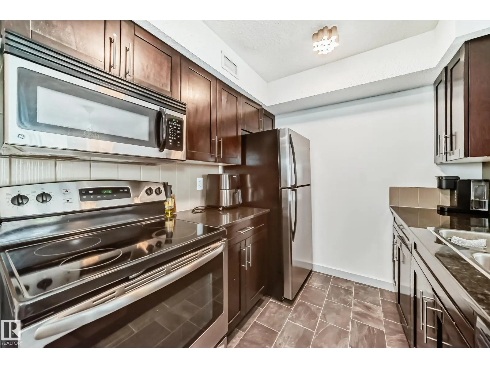 #303 1070 McConachie Blvd NW