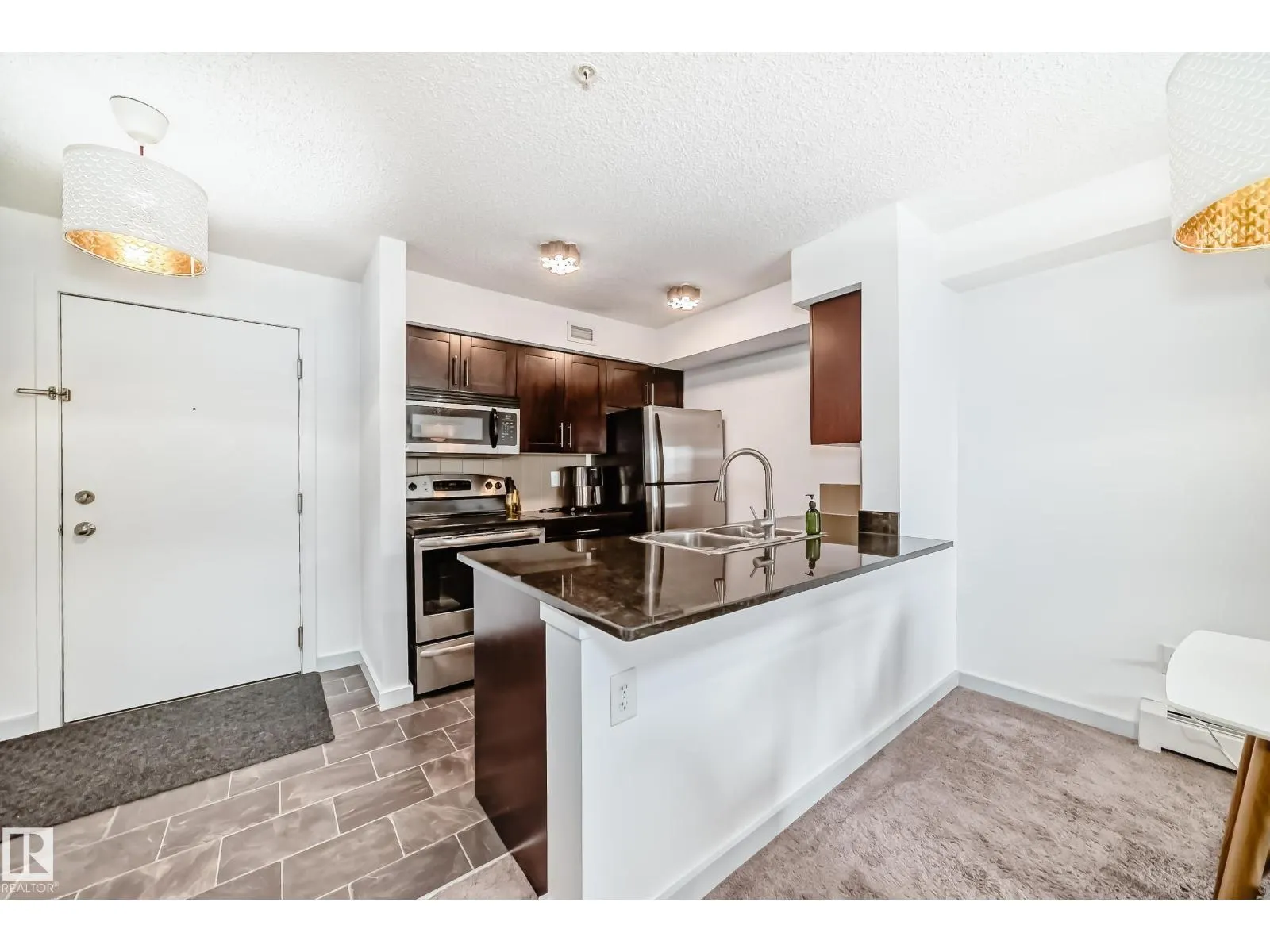 #303 1070 McConachie Blvd NW
