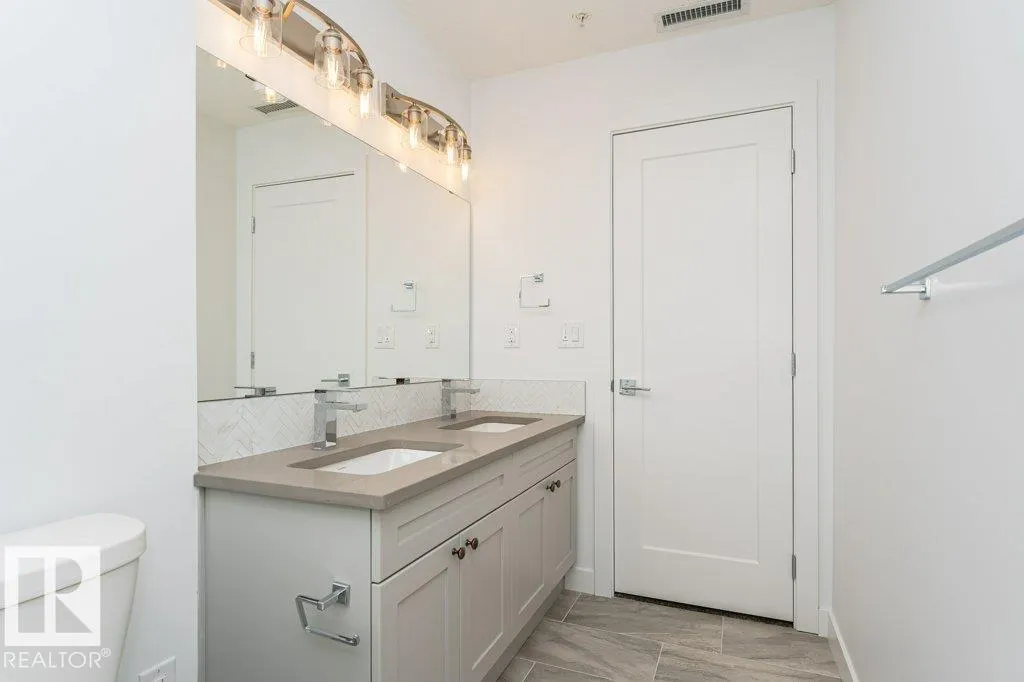 #306 1316 WINDERMERE WY SW
