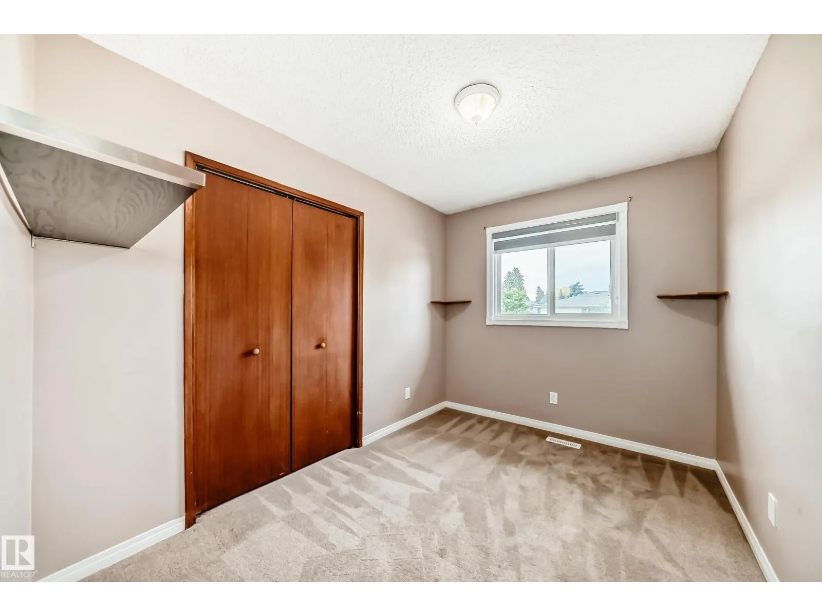 7026 11 AV NW