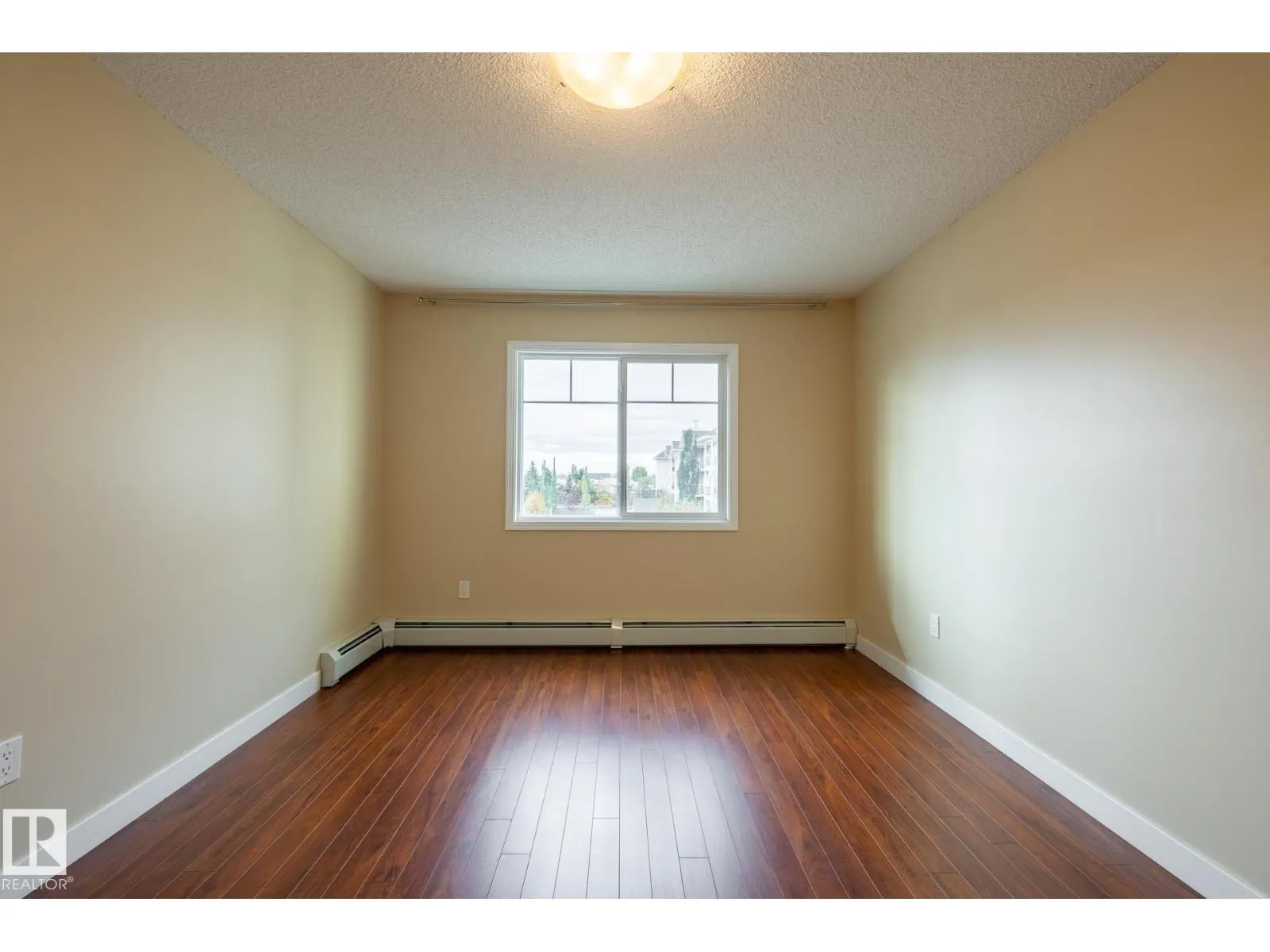 #303 12650 142 AV NW