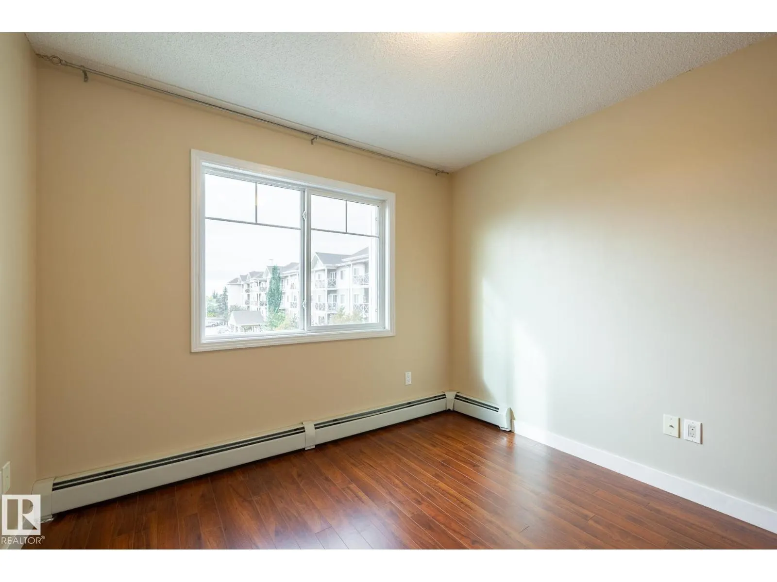 #303 12650 142 AV NW