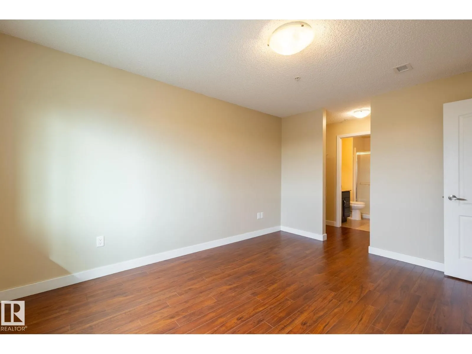 #303 12650 142 AV NW