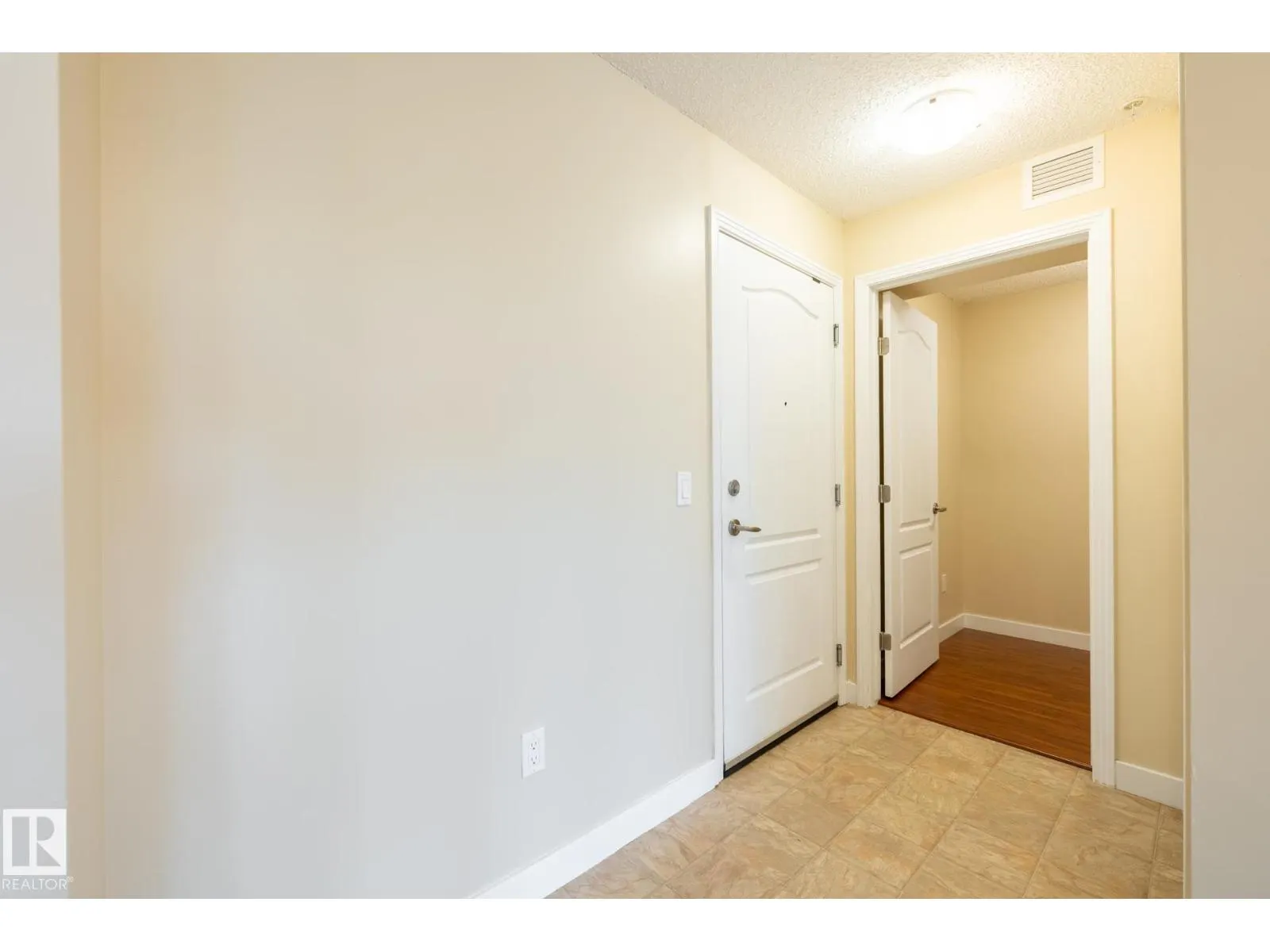 #303 12650 142 AV NW
