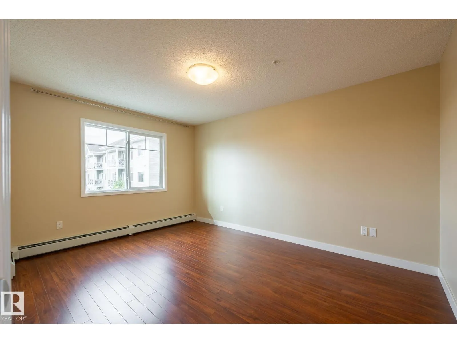 #303 12650 142 AV NW