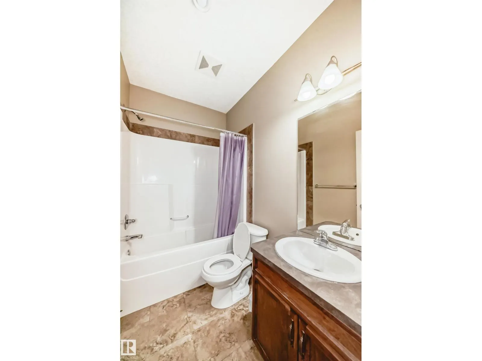 #13 12610 15 AV SW