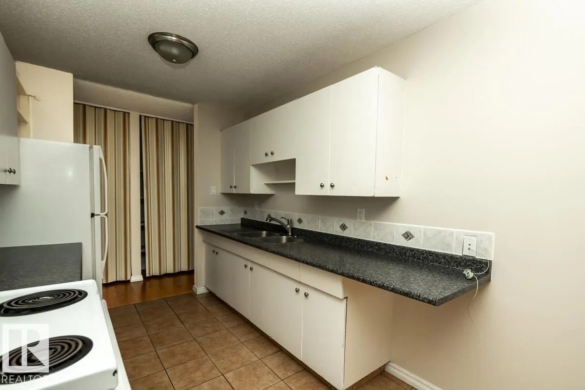 #301 7204 81 AV NW