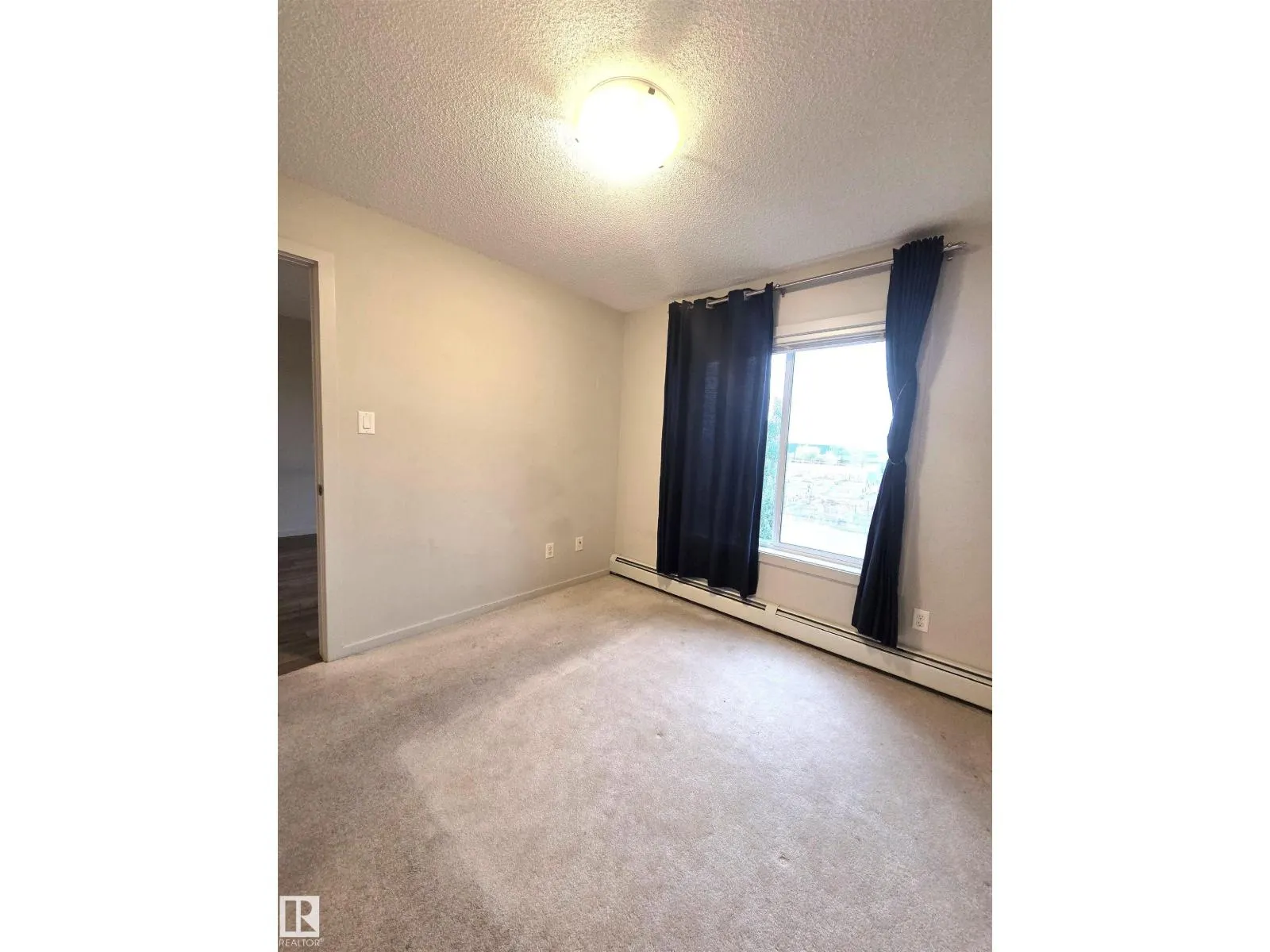 #332 390 WINDERMERE RD NW