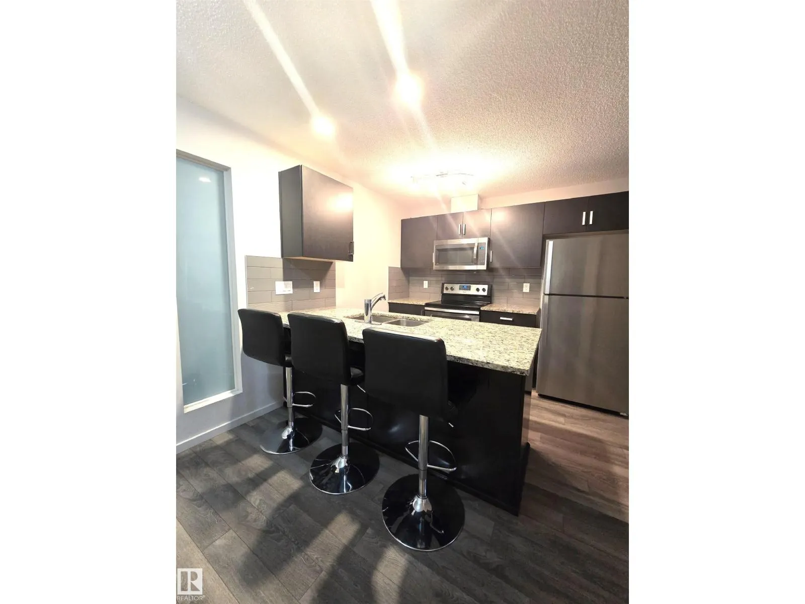 #332 390 WINDERMERE RD NW