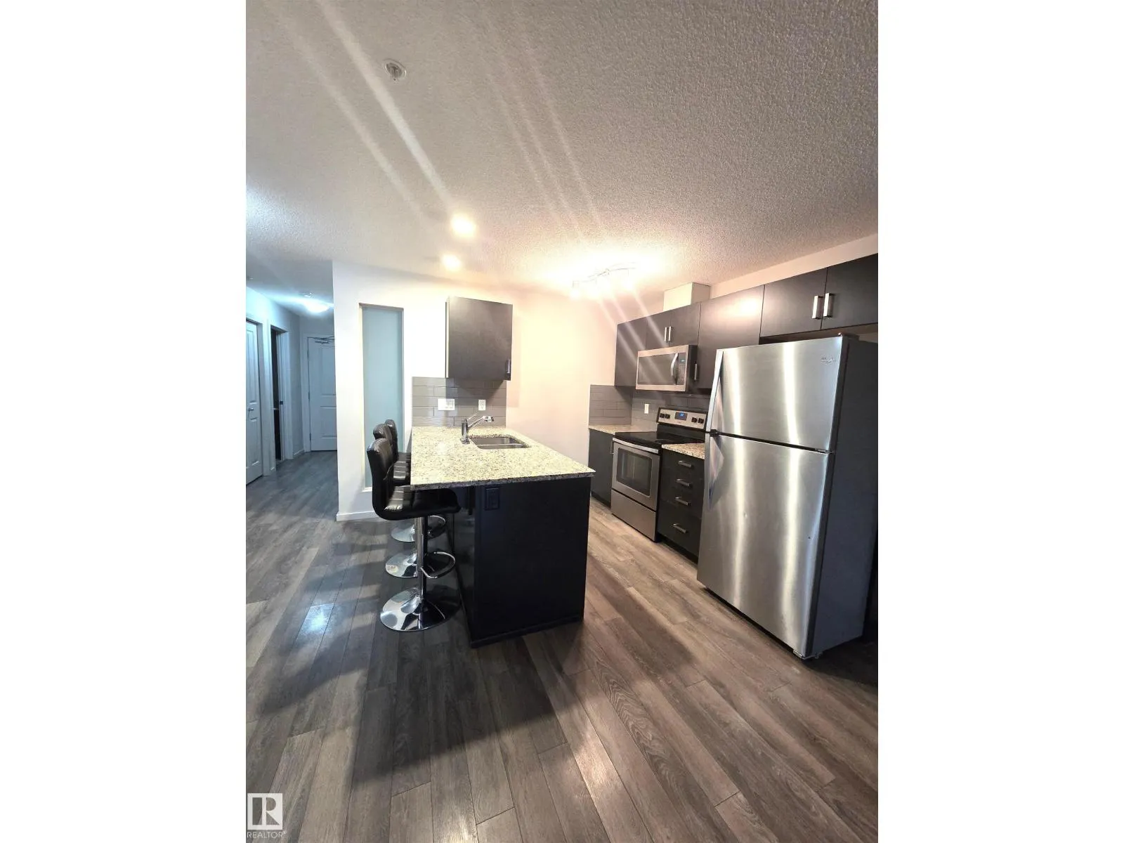 #332 390 WINDERMERE RD NW