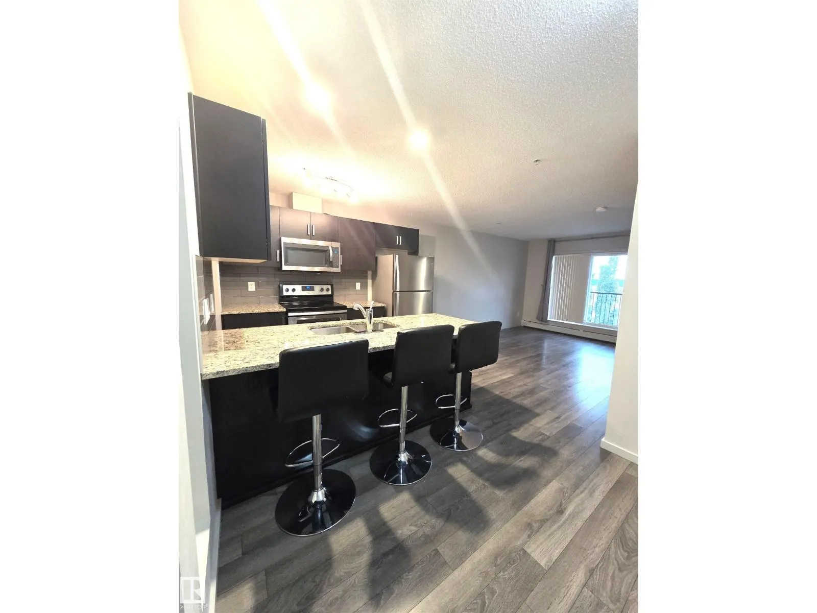 #332 390 WINDERMERE RD NW