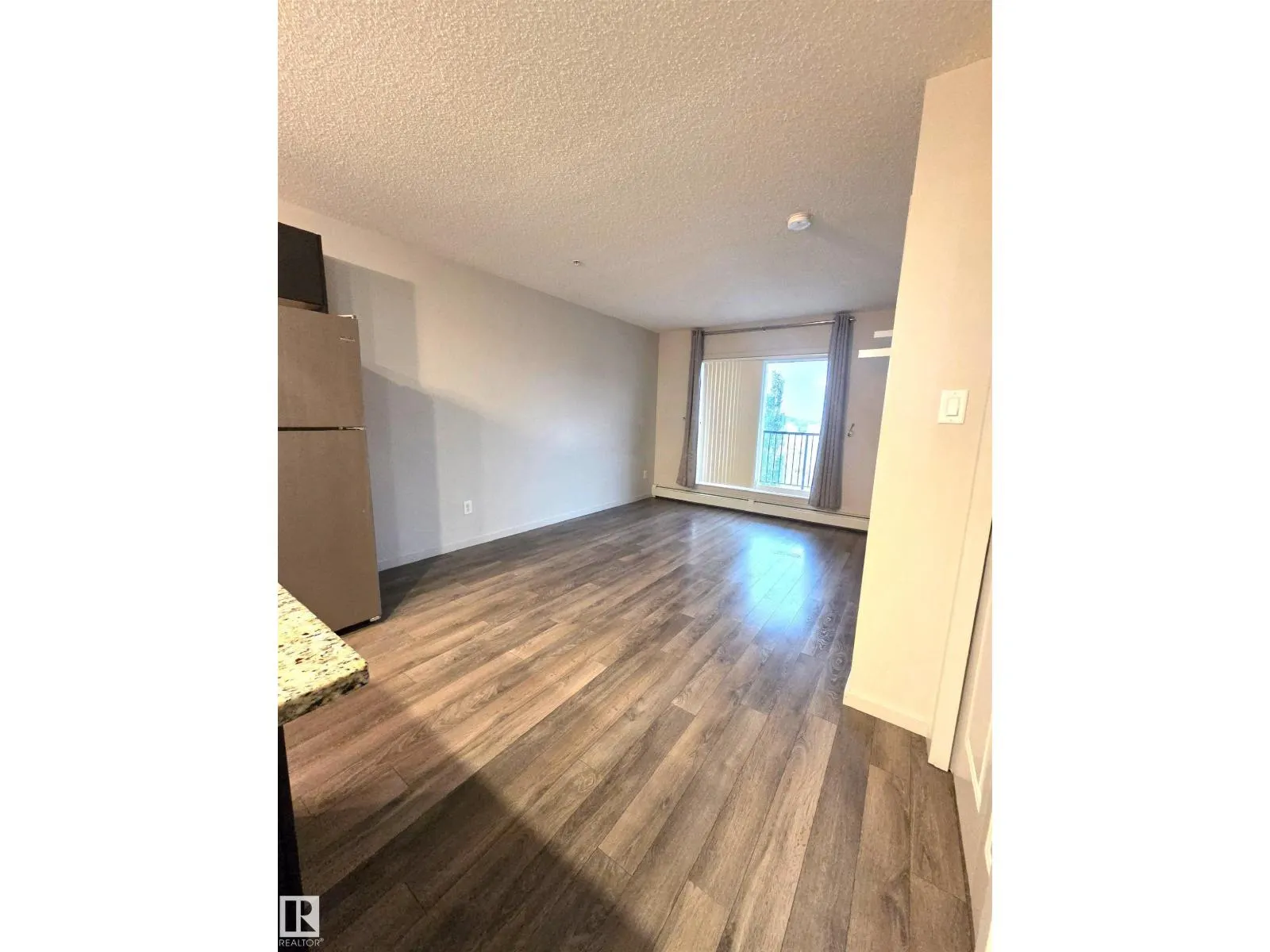 #332 390 WINDERMERE RD NW