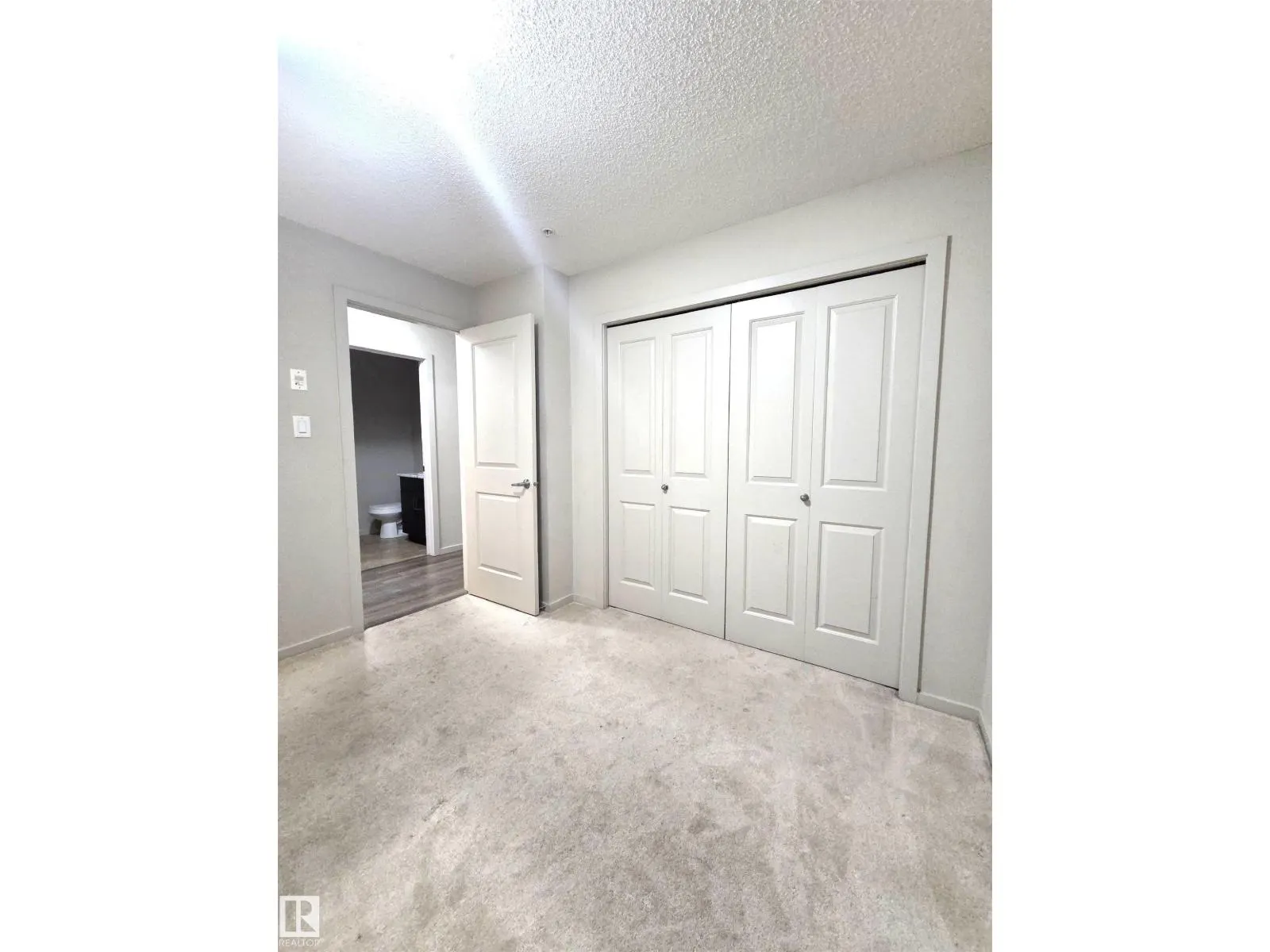 #332 390 WINDERMERE RD NW