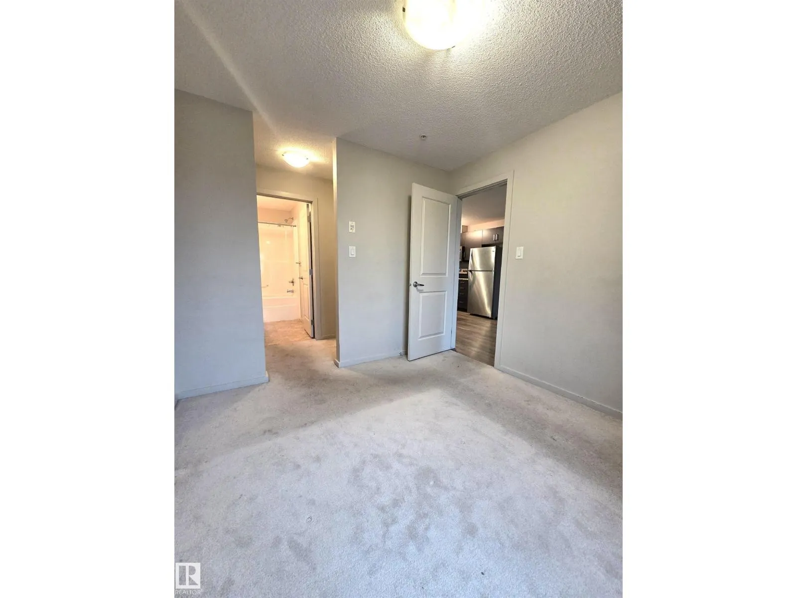 #332 390 WINDERMERE RD NW