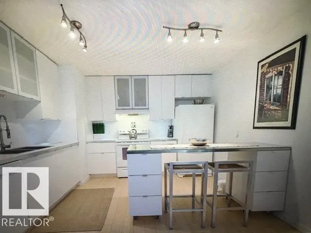 #104 10175 114 ST NW
